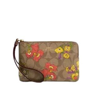 Coach Tan Wristlet with Red and Yellow Floral Design